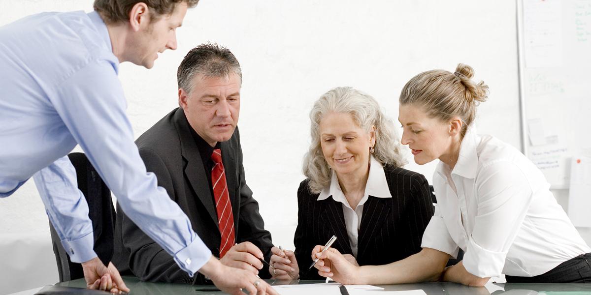 Stock photo of employees working together