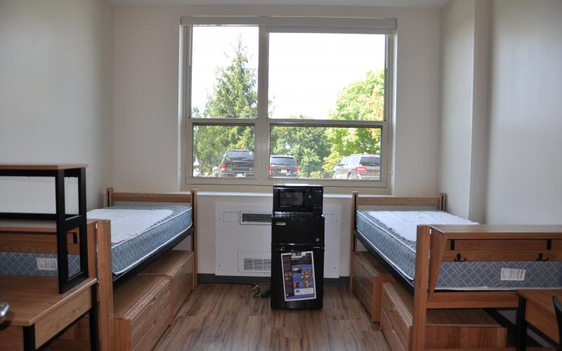 Typical 2-bed dorm room with movable furniture